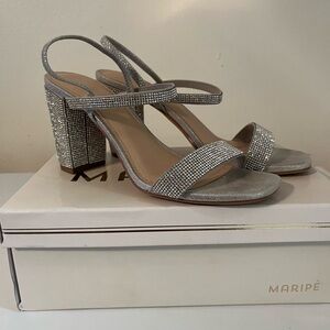 These are silver heels size 9.5